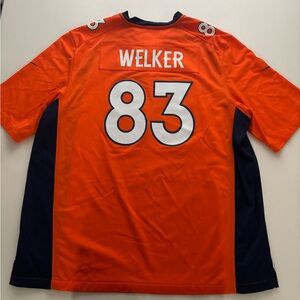 The broncos Welker 83 orange and blue xxl jersey (needs cleaning)